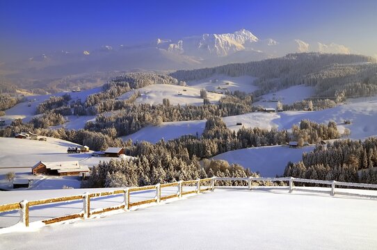 Appenzeller winter landscape in evening light with view on the Santis, Appenzell, Switzerland