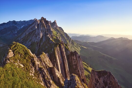 Alpstein mountains with ridge in the evening light, cloudless sky over Appenzellerland, Canton Appenzell Innerrhoden, Switzerland