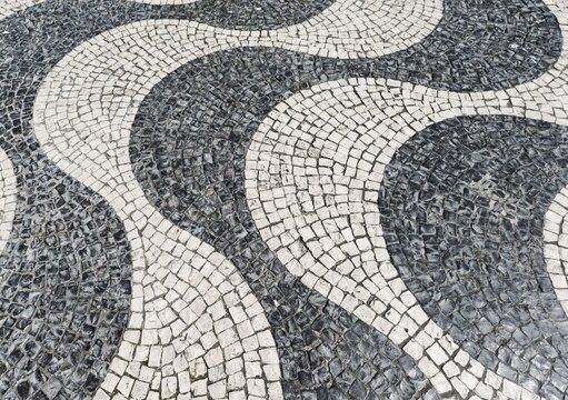 Wavy pattern in pavement, black and white, cobblestones, Rossio, Lisbon, Portugal