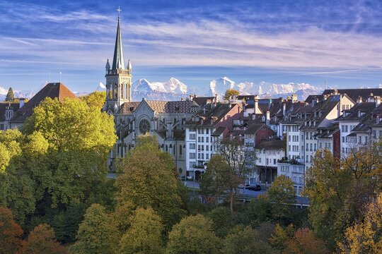 Bern's Old Town with St Peter and Paul Church, UNESCO World Heritage Site, snow-covered Bernese Alps behind, Canton of Bern, Switzerland