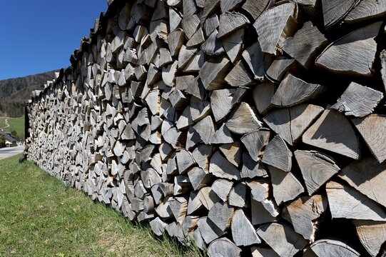 Piled-up firewood, logs, Ried am Wolfgangsee, Salzburg State, Austria