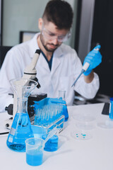Fototapeta premium Lab technician experimenting in lab