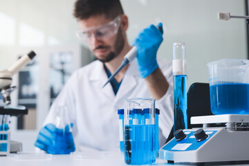 Fototapeta premium Lab technician experimenting in lab