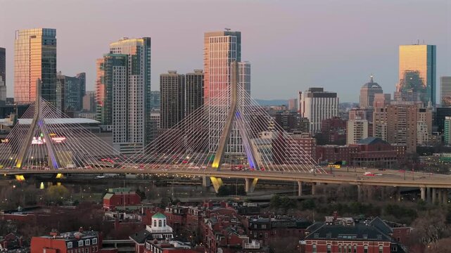Dawn commute over Zakim Bridge with Boston skyline