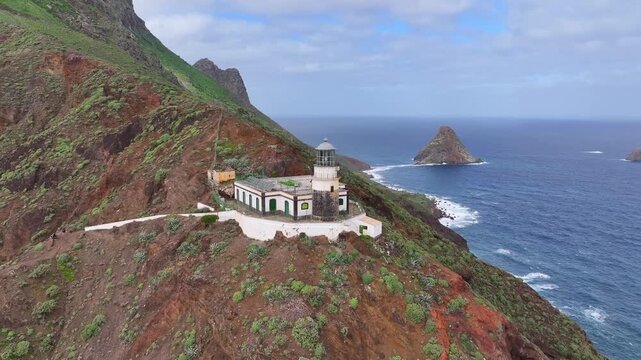 Punta de Anaga Lighthouse at the far north of Tenerife island. Blue ocean in the background. Canary Islands.