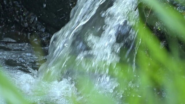 Small waterfall, a small and beautiful waterfall on a small stream in Brazil, 4k slow motion video.
