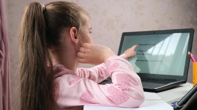 Hybrid education child doing homework at home with technology