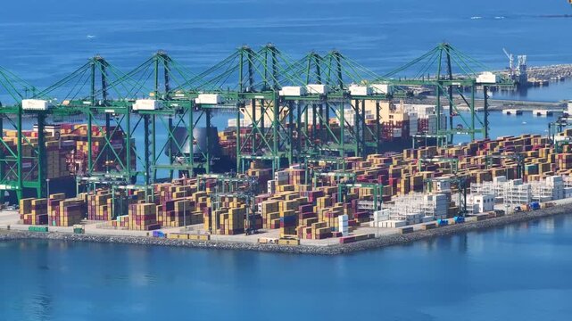 Global supply chain disruptions and shipping congestion in major ports observed from aerial view