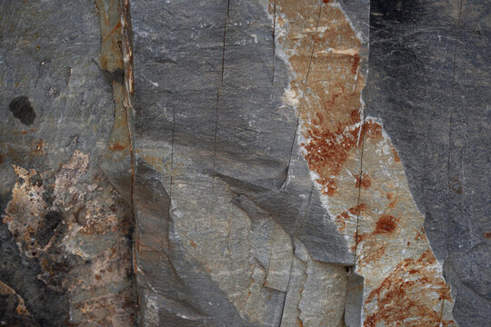 Close up view of natural weathered rock surface with mineral deposits