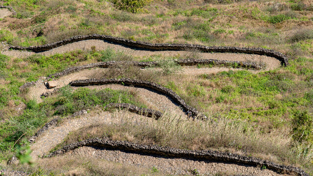 A winding pedestrian trail in the Paul Valley leading to Cabo da Ribeira Cova do Paul - Vila das Pombas, Ribeira Paul, Santo Ant&atilde;o Island, Cape Verde.
