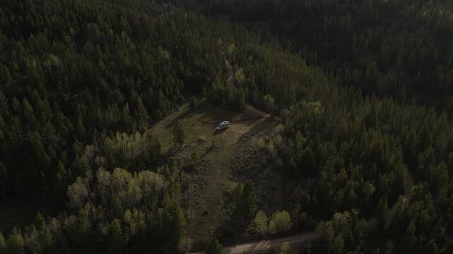 Aerial of truck camper camping in Ashley National Forest in Uinta Mountains in Utah in spring