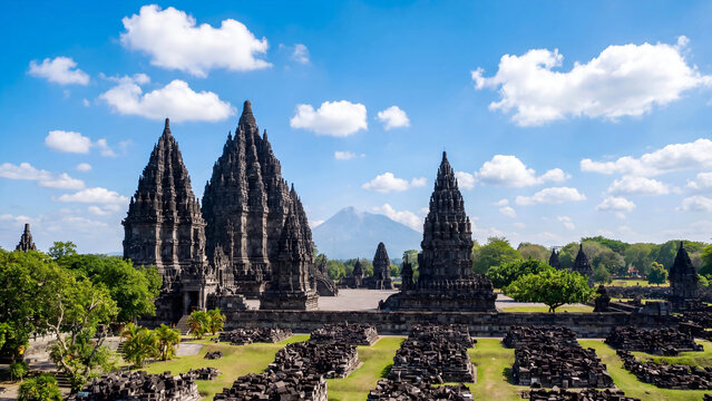 Prambanan temple complex with Mount Merapi volcano background