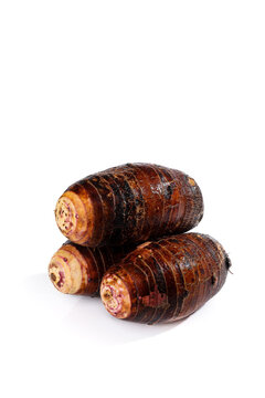 Fresh Lipu Taro Roots from Guangxi Province Studio Shot on White Background
