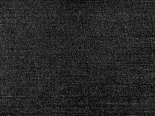 Fototapeta premium Dark black denim fabric texture for fashion background