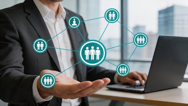 Businessman holding holographic network icons, connecting people and teams in digital communication, corporate social media concept, remote work collaboration, professional office