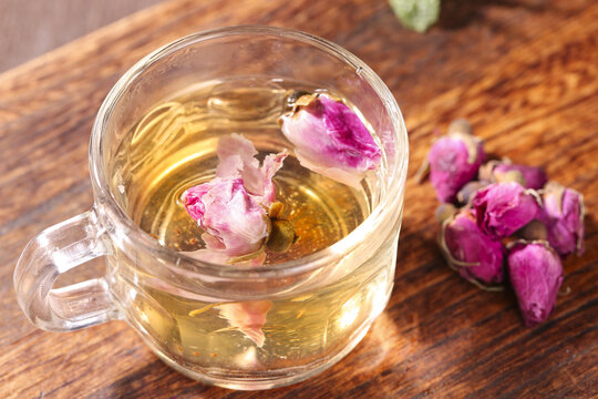 Traditional Chinese Rose Tea with Dried Petals in Glass Cup - Healthy Herbal Drink