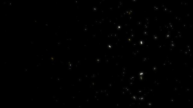 Elegant sparkling golden warm light particles floating slowly and dissolving in abstract dark space motion