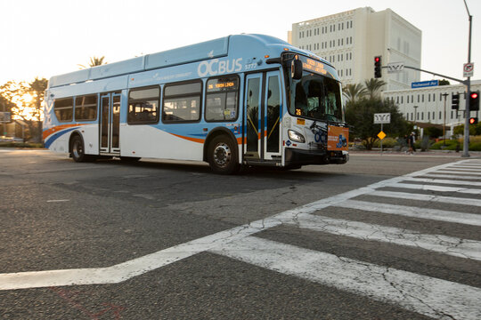 Fullerton, California, USA - May 15, 2026: An OC Bus from the Orange County Transit Authority passes along Nutwood Avenue.
