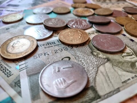 Indian currency composition with notes and coins