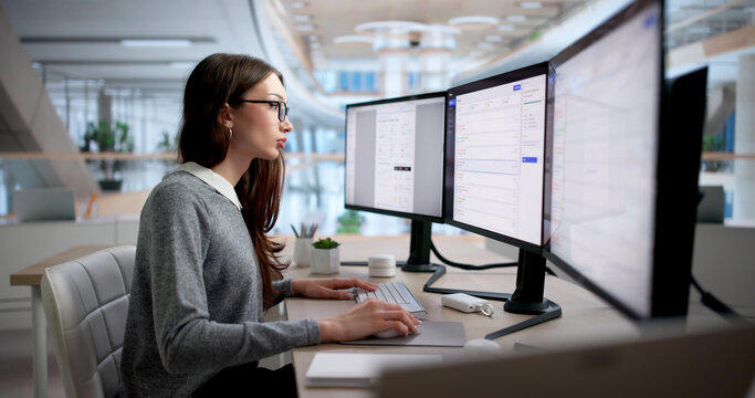 Young Female IT Support Specialist Efficiently Resolves Help Desk Tickets