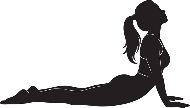 Silhouette of a woman in a cobra pose doing yoga
