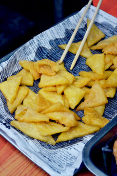 Tohu (Burmese Chickpea Tofu) for sale at street food stall. 