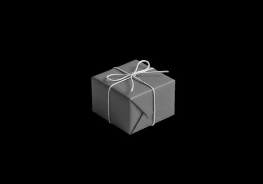 Small grey gift box with white string bow