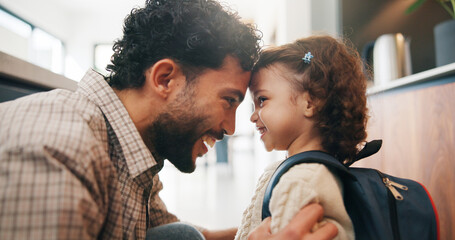Education, dad and child with backpack in house, laughing and getting ready for first day of school. Happy man, home and help girl with bag for daycare, morning routine and preparing toddler to leave © peopleimages.com