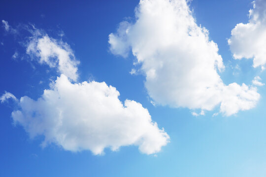 White Clouds in Clear Blue Sky