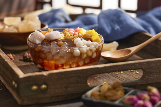Traditional Chinese Ice Jelly Dessert with Brown Sugar and Taro Balls
