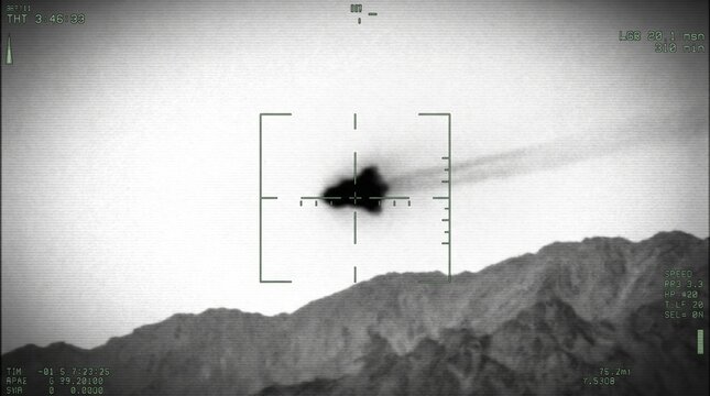 Military drone targeting system view of an explosion in a mountainous region.