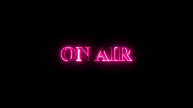 Neon o n a i r sign glowing in dark studio broadcasting live stream red text media production