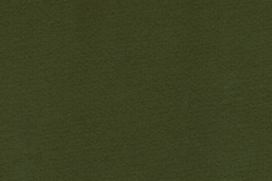 Dark olive green background with soft vertical texture and matte finish ideal for decorative and vintage designs. Luxury background of dark olive velvet. Military Green.