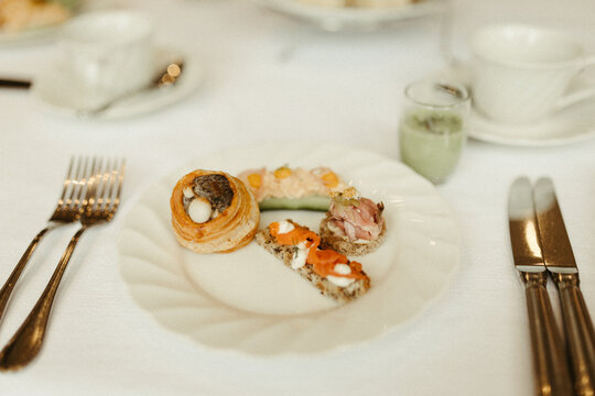 A plate of elegant canap&eacute;s for afternoon tea