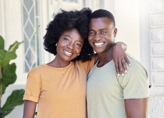Obraz premium Happy, portrait and couple hugging for new house, property or real estate investment. Smile, love and black man and woman with bonding, connection and together outdoor for commitment at home