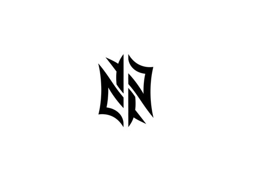 Symmetrical black tribal tattoo design with sharp angular lines on white background
