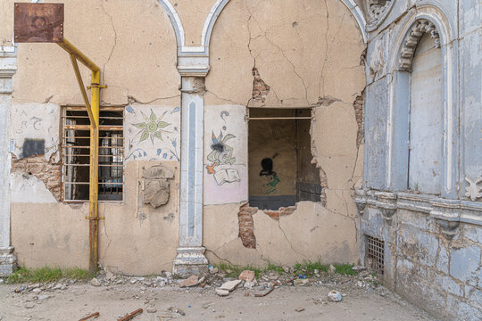 Overpainted images of Western comic characterson the walls of the Al Tahera Church outbuildings in Mosul, Iraq