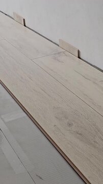 Watch the process of installing wooden flooring and see each step clearly from start to finish in this home improvement project