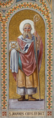 Obraz premium MONZA, ITALY - MARCH 19, 2026: The fresco of St. C John Chrysostom in church Chiesa della Santissima Trinita degli Artigianelli by Giovanni Briani from end of 19. cent.