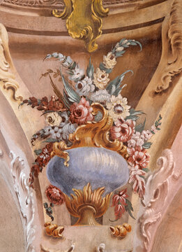 VERCELLI, ITALY - JANUARY 16, 2026: The roccoco fresco of flower in the church Chiesa di San Giuliano by unknown artist