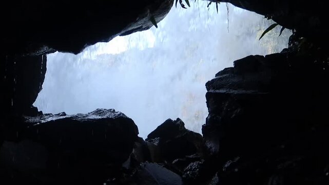 Scenic cave view of Thoseghar Waterfall during monsoon in Satar