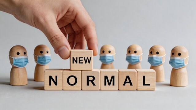 New normal concept after pandemic, wooden figures wearing medical face masks, hand placing block with text, social distancing rules, health safety measures, post coronavirus