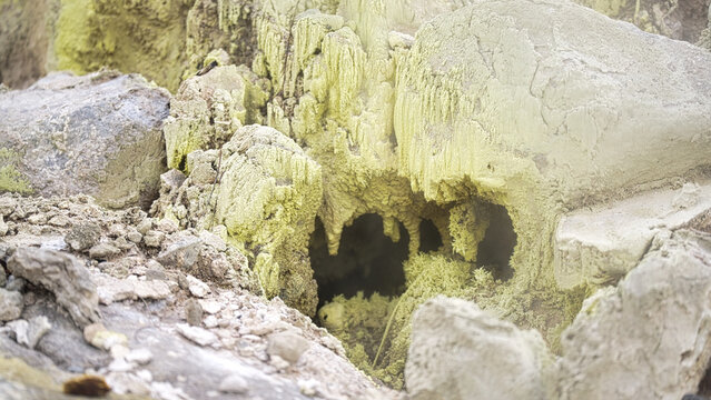 acicular sulphur crystals, mineral deposits, growing inside fumarole vent, tomohon, minahasa, north sulawesi, indonesia, macro, close up