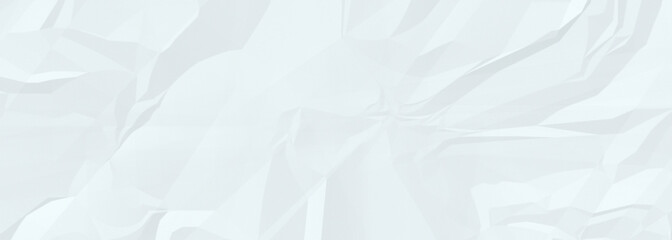 Obraz premium Crinkled white paper texture with deep folds and creases throughout surface