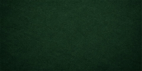 A dark green textured paper and felt material backdrop with a macro pattern surface resembles an old poker table cloth or a blank canvas wallpaper design © Kazim