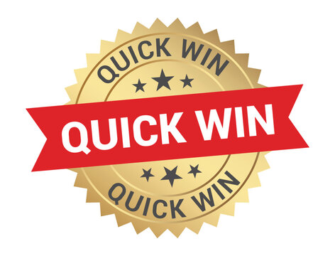 quick win label with red ribbon gold starburst design on white background