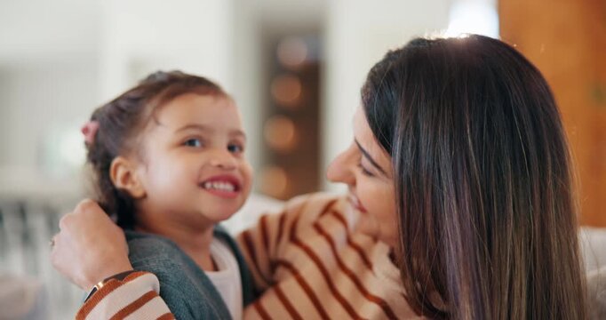 Kiss, cheek and mom with child on sofa with affection, bonding and loving relationship in home. Family, happy and mother with girl embrace for connection, love and trust for parenting in living room