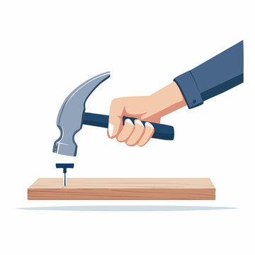 Hand hammering a nail into a wooden plank