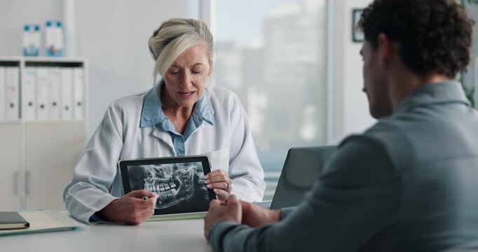 Dentist, patient and x ray in office with tablet screen, talk and orthodontic advice for diagnosis. Healthcare worker, people and discussion with tech, dental scan and test results for teeth wellness