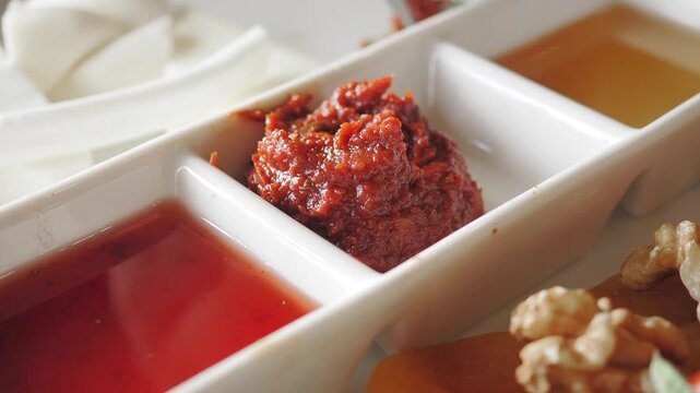 Dipping sauces and snacks at local restaurant during lunch